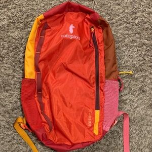 Cotopaxi Batac 16L Del Dia pack in sunset color scheme